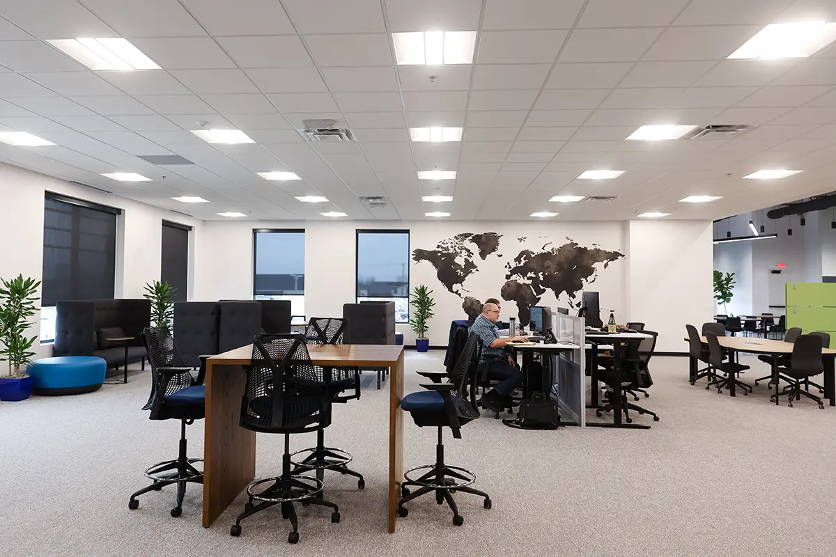 Conference room in Fishers Indiana with large meeting table and custom graphic feature wall