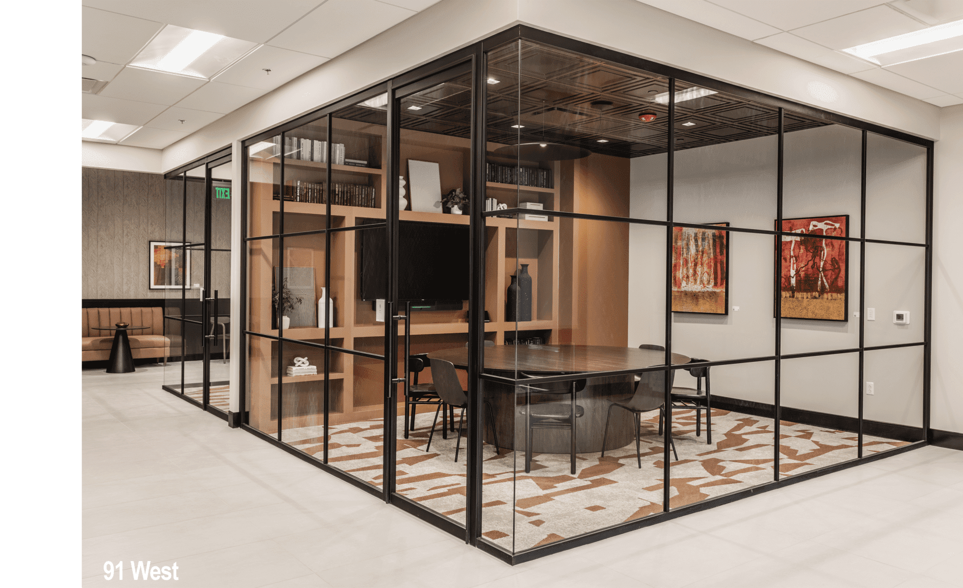 Glass conference room design in Indianapolis office with modern furniture and enclosed meeting space