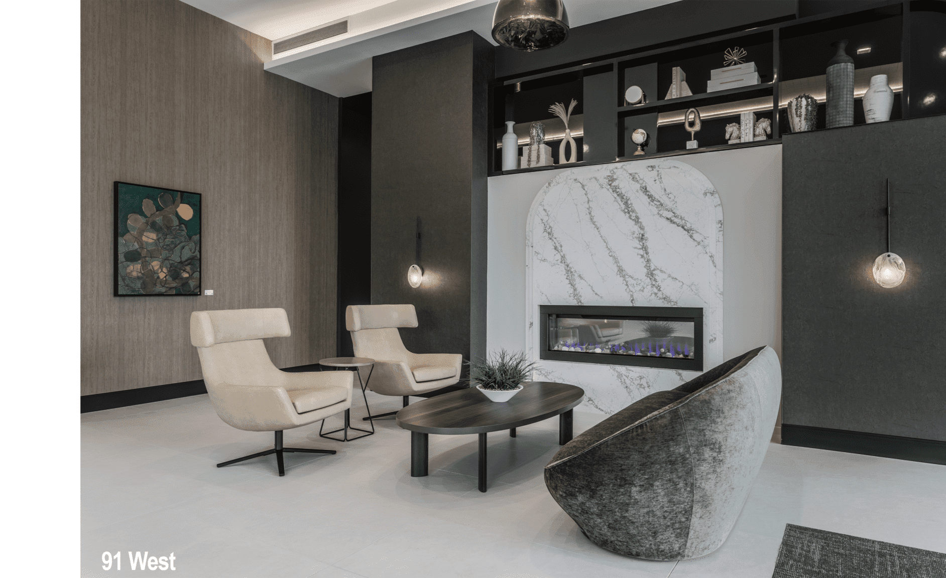 Modern luxury office lounge interior design in Indianapolis featuring fireplace, soft seating, and built-in shelving