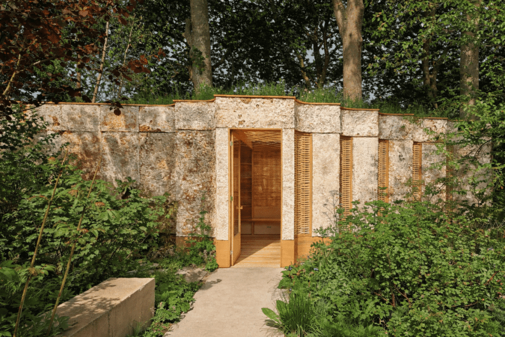 Biophilic outdoor structure with natural materials, greenery, and integrated architectural design